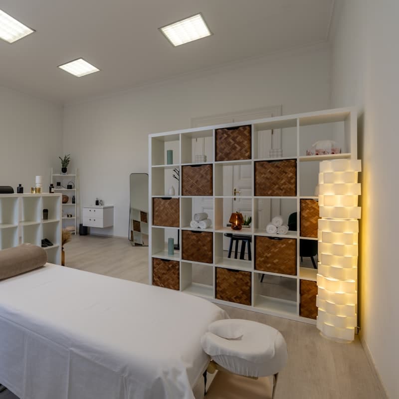Clean, private massage treatment room ready for a session